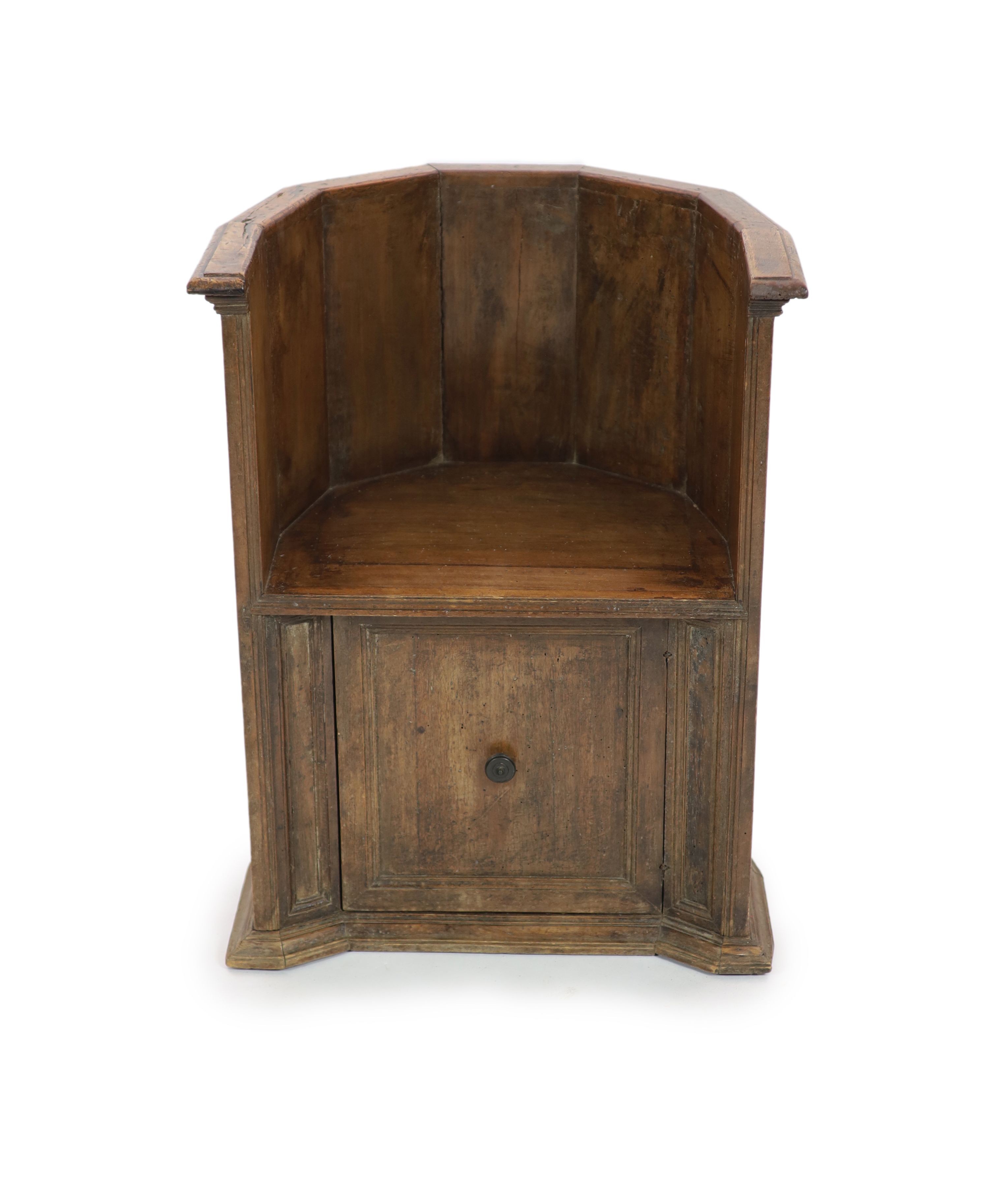 A late 16th century Italian walnut tub chair, possibly Tuscan, having H 79cm. W 60cm. D 46cm.